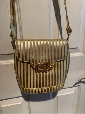 Unk Gold Striped Crossbody with Elephant Accent